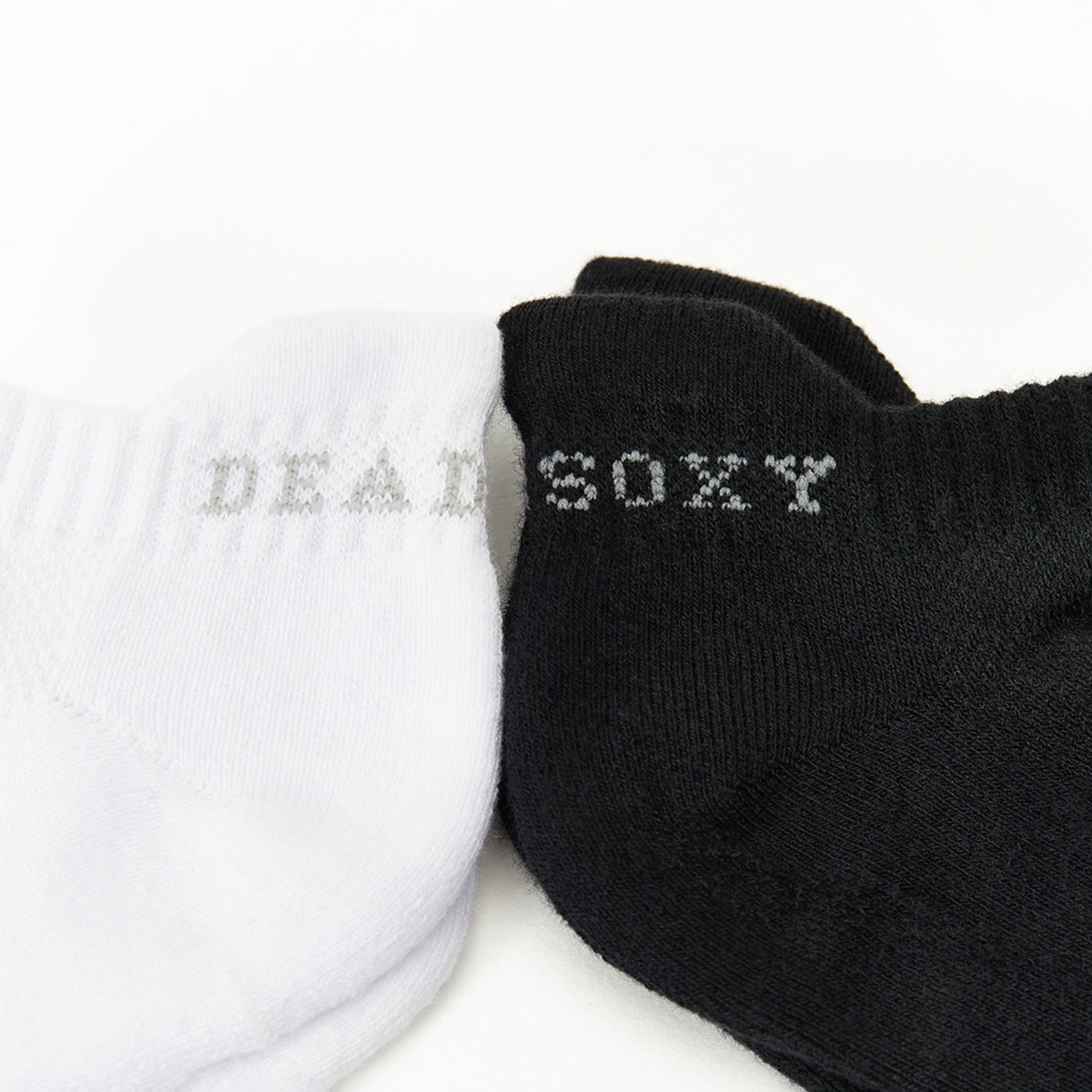 2 pack ankle socks black and white with DeadSoxy on the heel