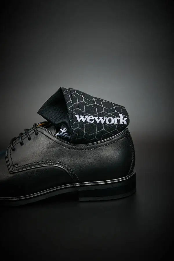 Custom WeWork corporate branded dress socks with geometric pattern by DeadSoxy
