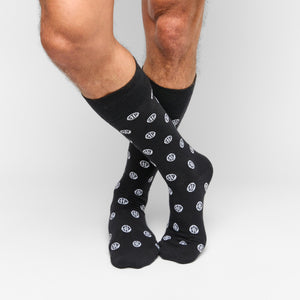 Black Sip Dots Dress Sock with 'Sip' dot pattern shown on legs.