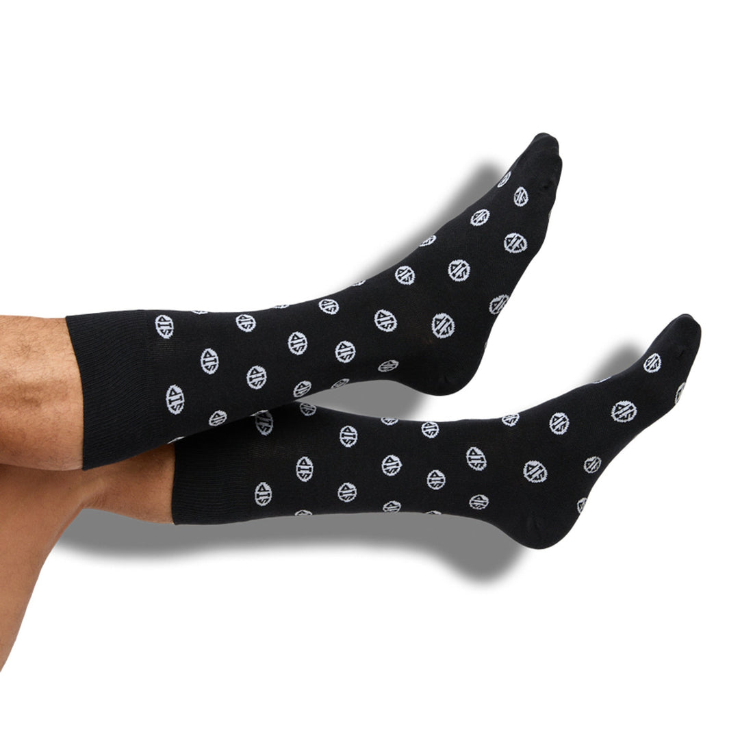 Black Sip Dots Dress Socks with Sip dot pattern with flat seams.