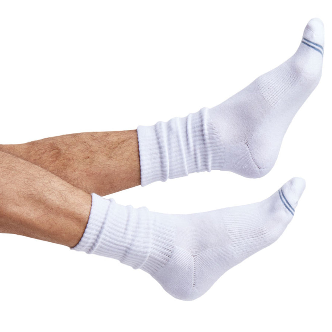 one pair of black casual crew socks with two accents on the toe shown on foot.
