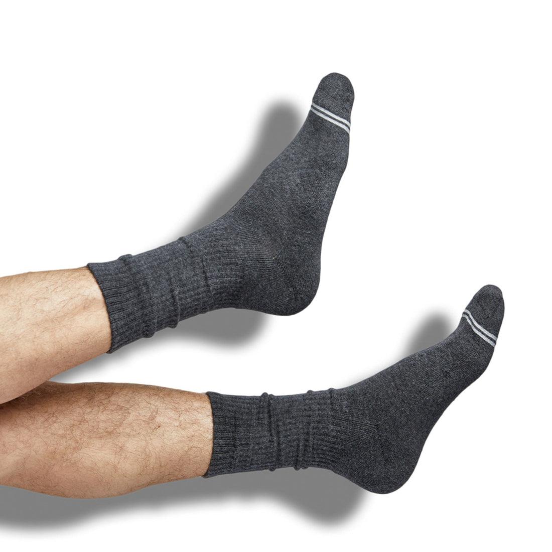 one pair of charcoal casual crew socks with two accents on the toe shown on foot.
