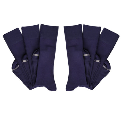 6 pairs of perfect navy boardroom socks folded at heel layered overtop one another