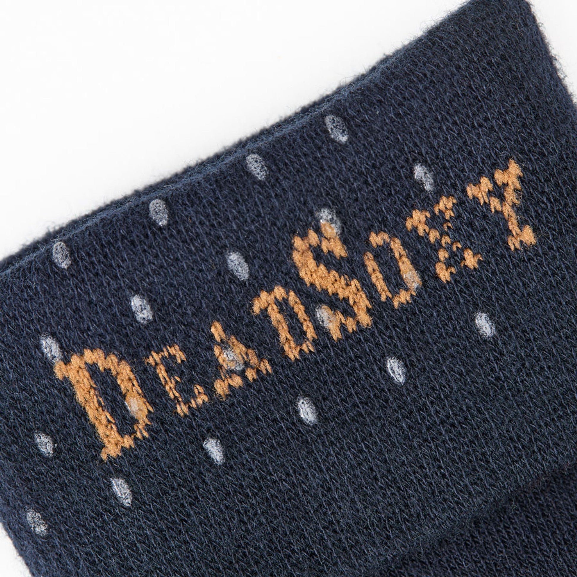 TrueStay‚Ñ¢ Grip in welt of tan dress socks with DeadSoxy in brown