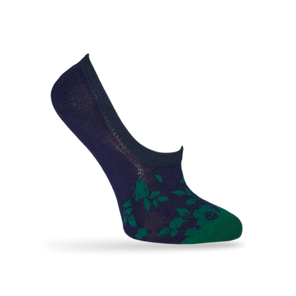 1 navy blue no show sock with a solid green toe and green leaf pattern towards the front displayed on a mannequin heel lifted