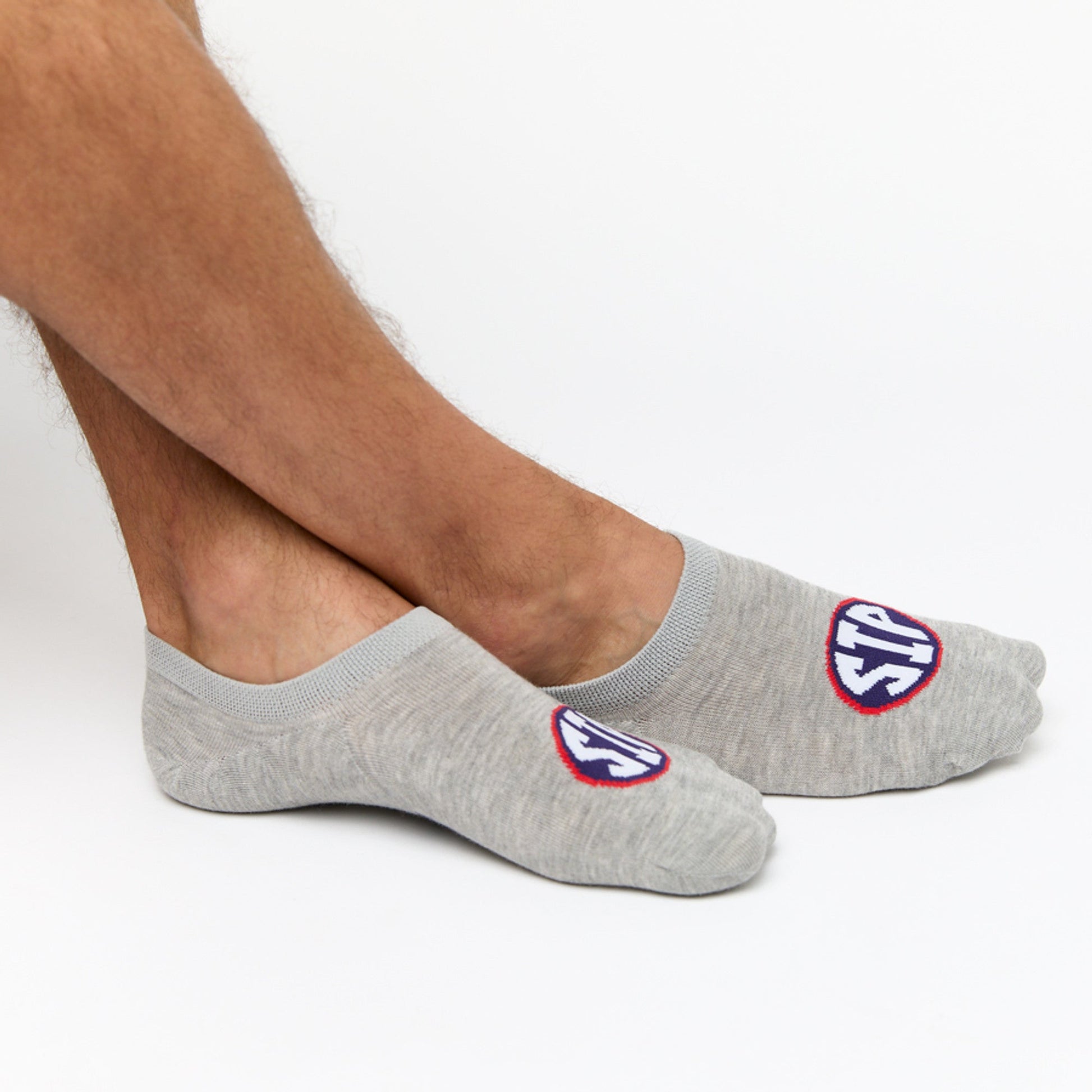 Grey no show liner socks with SIP on the top of the foot for Ole Miss.