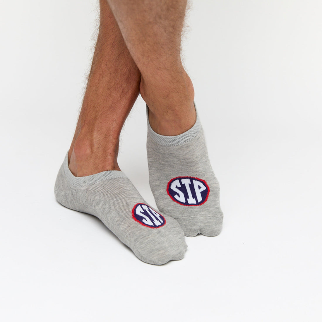 Grey no show liner socks with SIP on the top of the foot for Ole Miss socks.