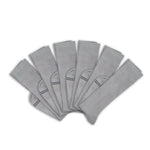 3 grey socks folded at ankle and layered on top of one another