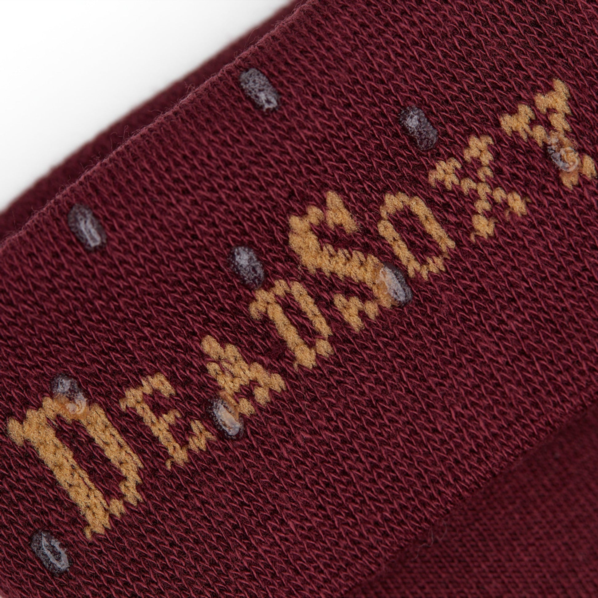 close up of the welt and DeadSoxy's TrueStay‚Ñ¢ sock technology on deep red burgundy and maroon dress socks