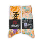 Signed label 1/77 not.travis casual athletic socks with peach base color and tie dye design shown laid out flat.