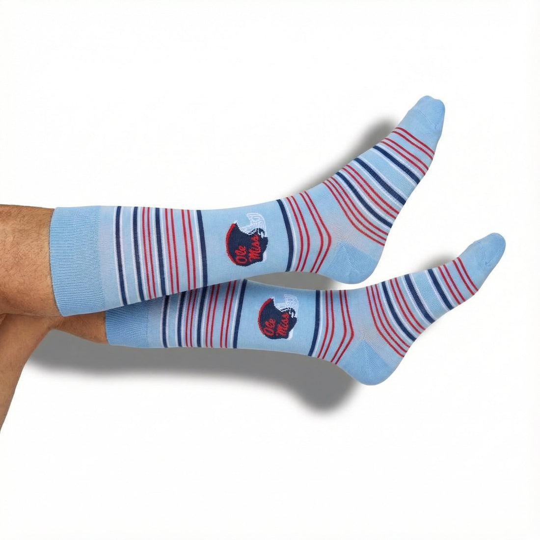 Powder-blue dress socks with navy wave stripes and helmet and Ole Miss script accent — side view