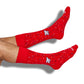 Red Ole Miss dress socks with navy and white confetti pattern and script M logo, shown on a white background.