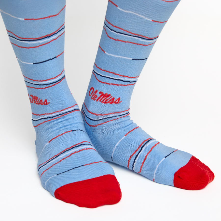 Close-up of Powder Wave Stripe Dress Socks showcasing flowing stripe design.