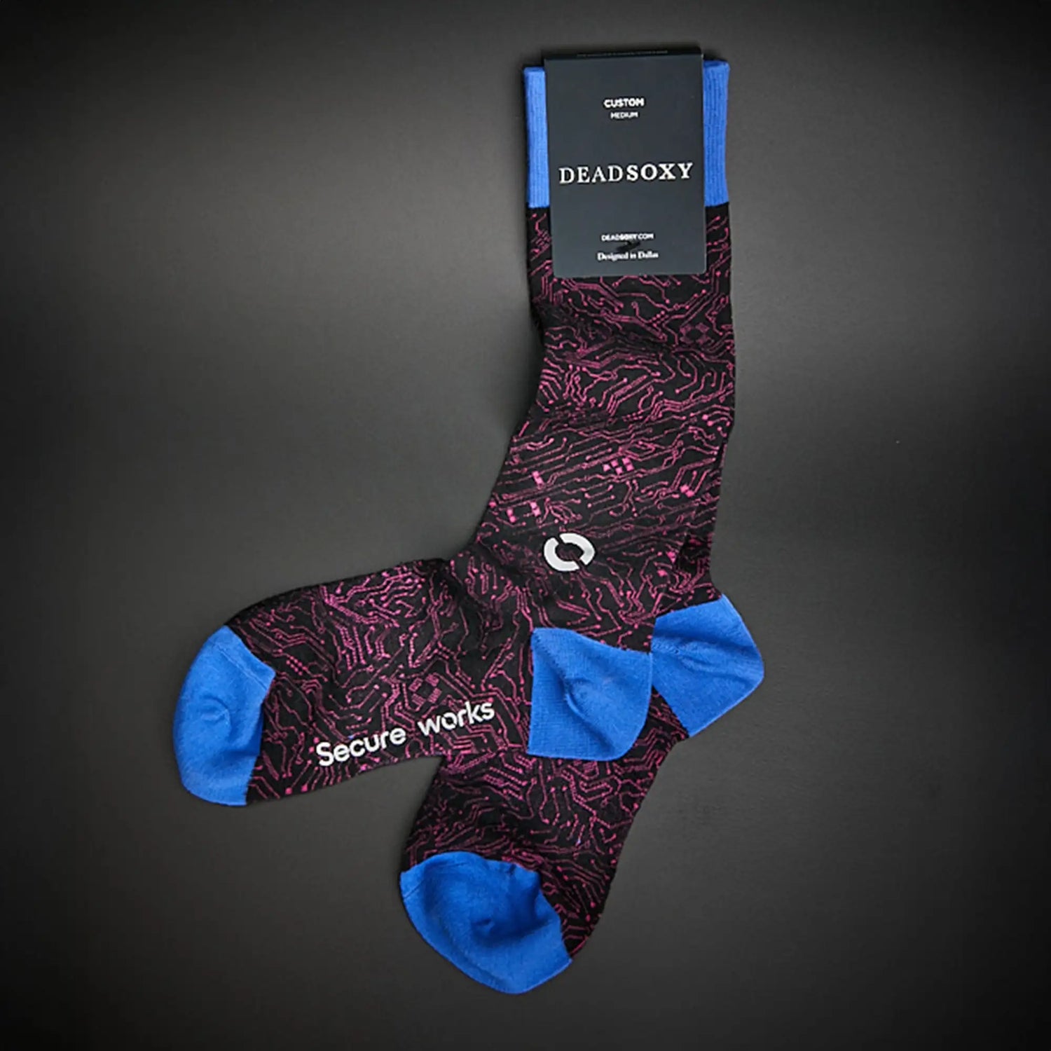 Custom branded dress socks with SecureWorks company logo and blue accent colors