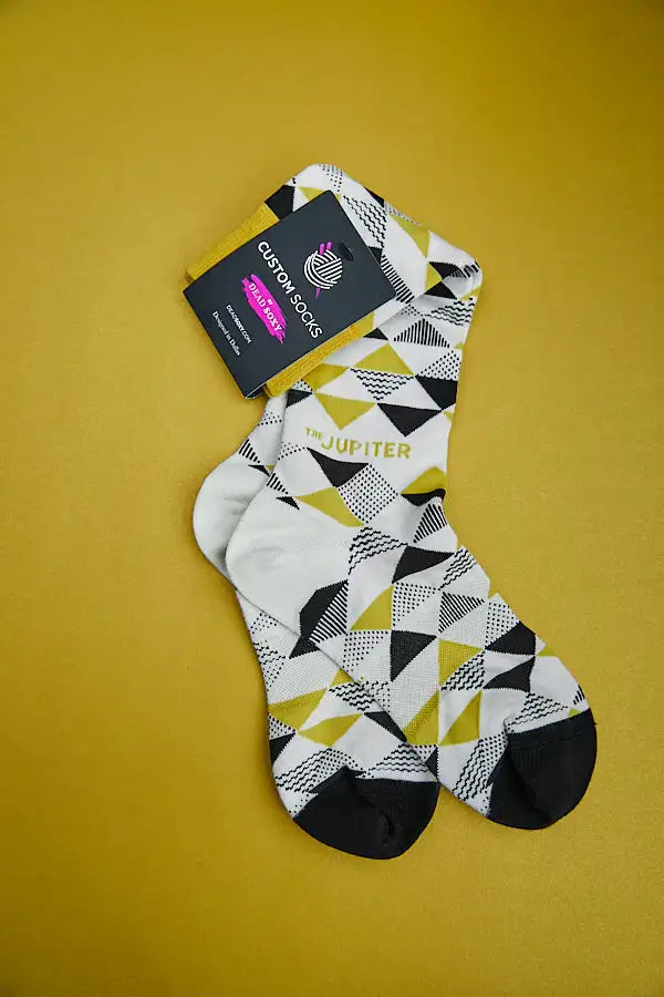 Custom geometric patterned socks with Jupiter branding