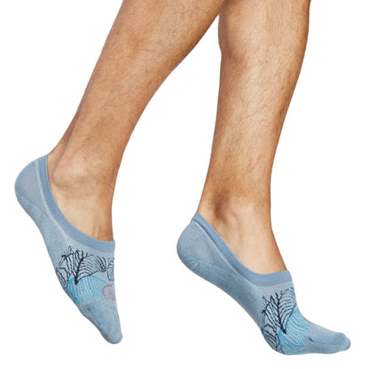 1 pair of no show socks in solid powder blue with multi color leaf pattern in pink blue navy and white worn by male model