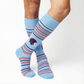 Close up, powder-blue dress socks with navy wave stripes and helmet and Ole Miss script accent