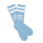 Powder blue casual socks with two retro stripes and the number 25 on the ankle laid out flat.