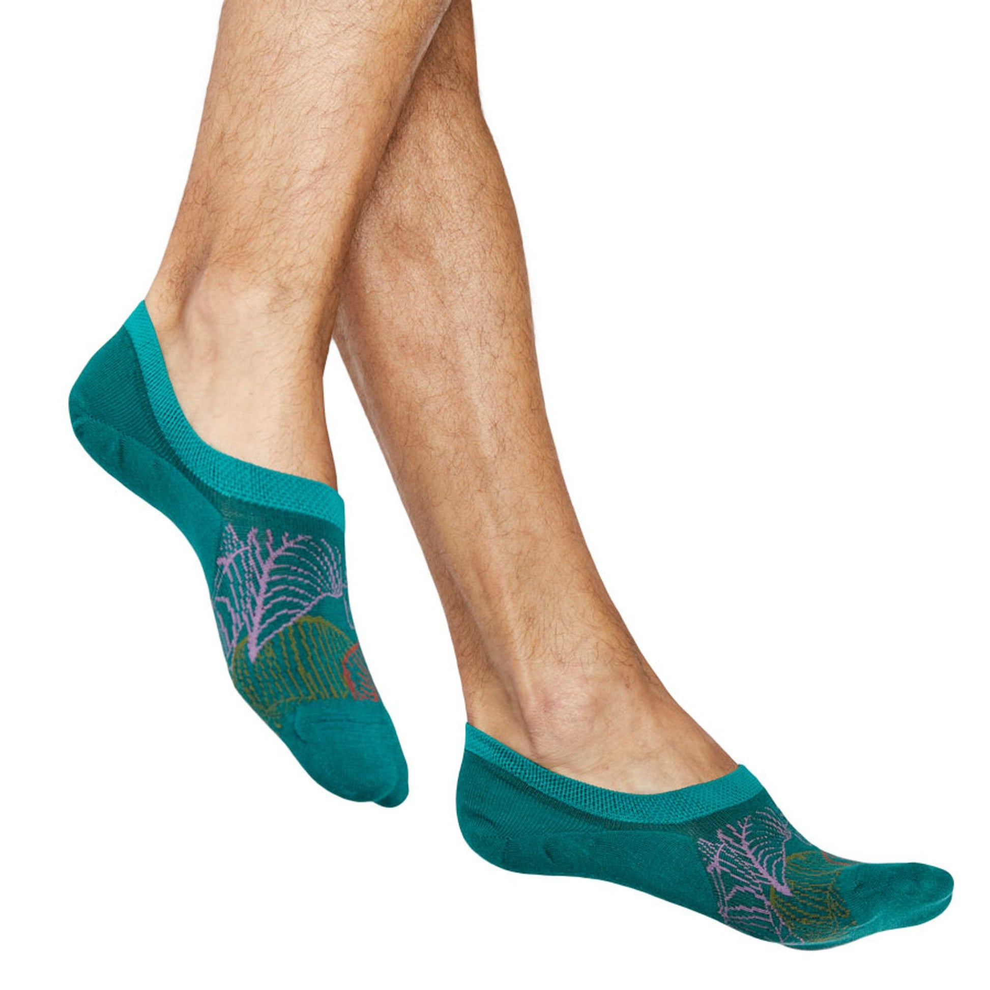No show socks on man solid teal with a multi color leaf pattern in green orange blue and pink
