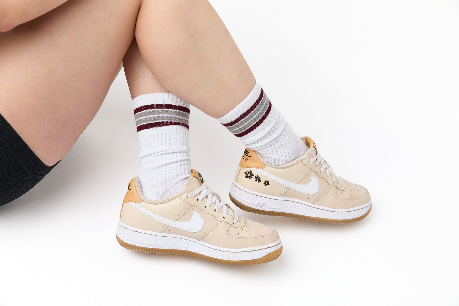 white crew socks with Howdy on the leg worn by a woman in black tights