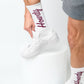 White Howdy Casual Socks with 'Howdy' text going up the leg in maroon. on mannequin.