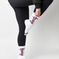 white casual crew socks with cushion and Howdy going up the leg on a woman in black leggings