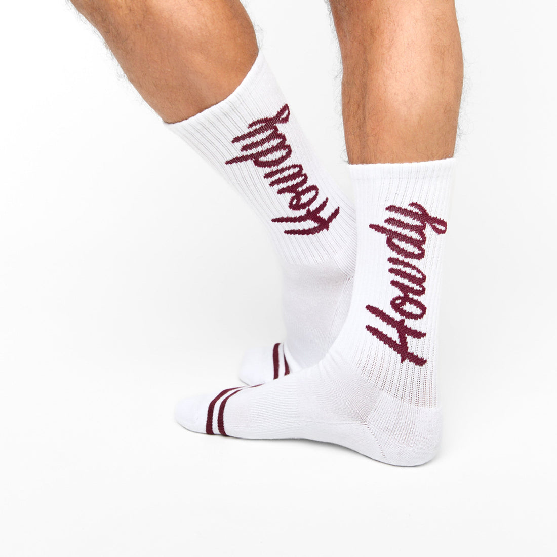 White Howdy Casual Socks with 'Howdy' text going up side of leg laid flat.