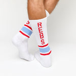White Casual Crew Socks with 'Rebs' down the back of the leg retro stripes on the ankle in powder and red.