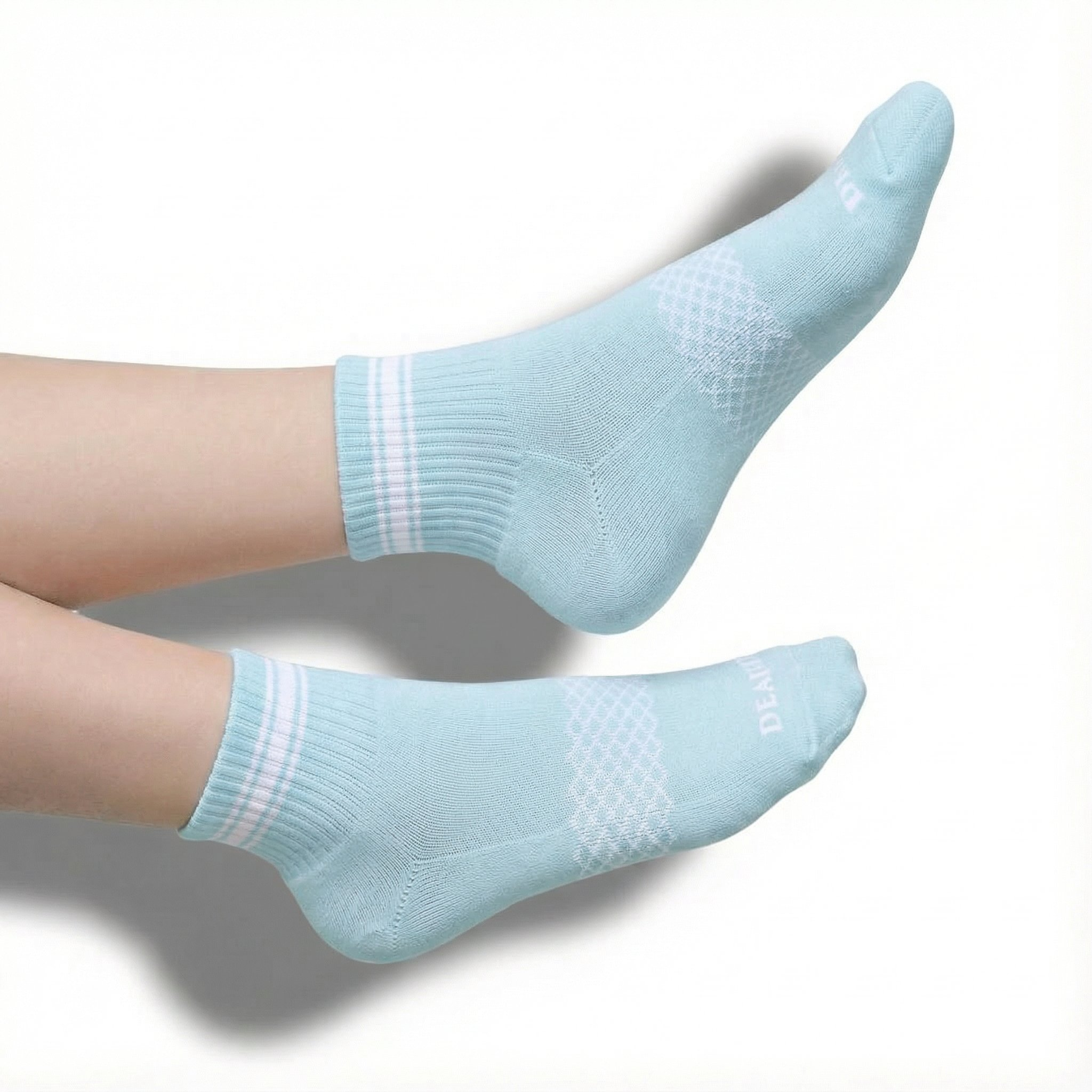 Blue and white quarter crew socks worn on legs, with cuffs above the ankle